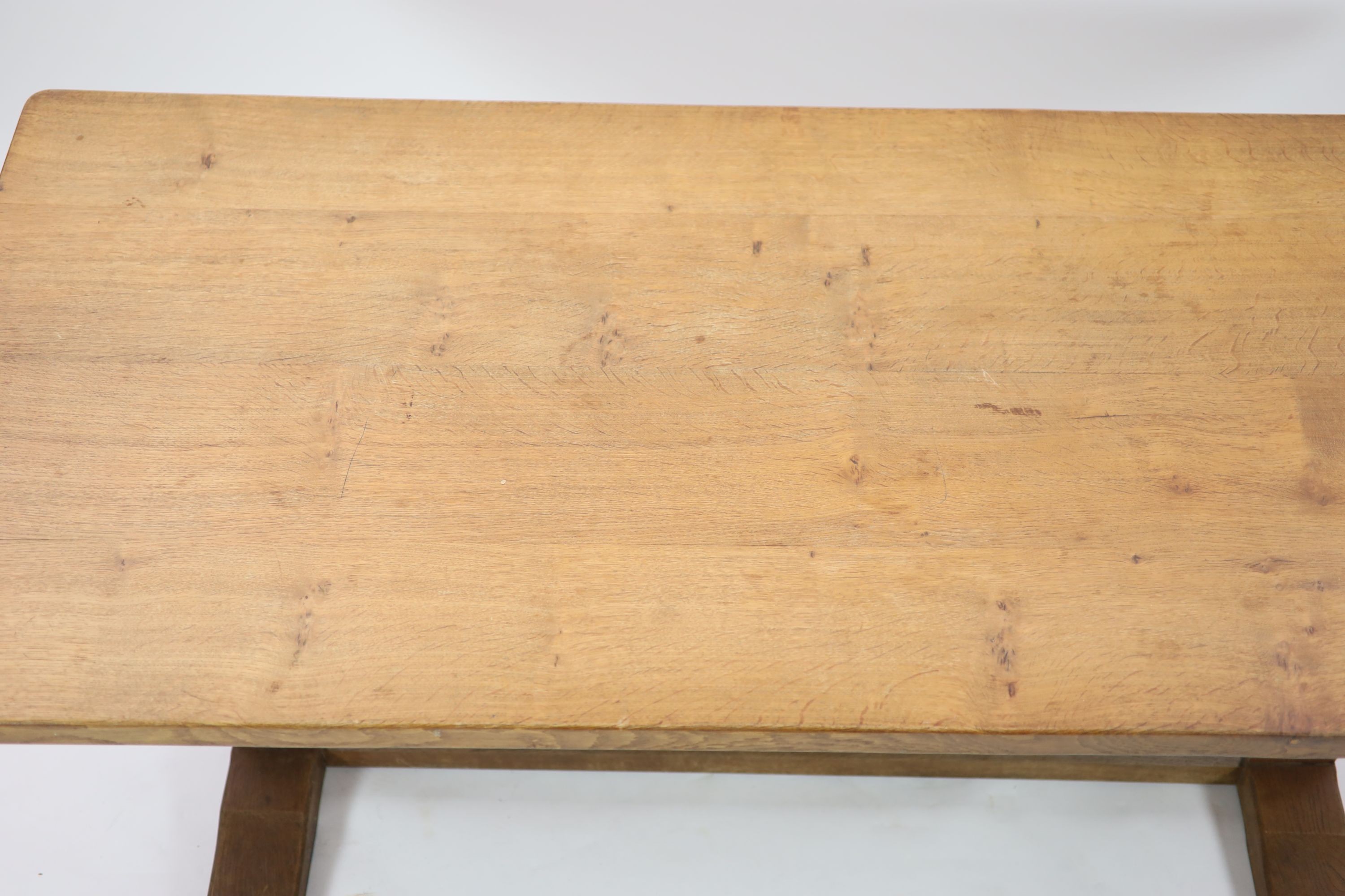 A Robert Thompson Mouseman adzed oak refectory table, W.180cm D.86cm H.74cm
